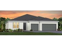 One-story home with gray roof, white walls, and two-car garage at 5190 Foothills Preserve Loop, Mount Dora, FL 32757