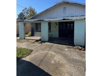 Ranch style home with covered porch and needs renovation at 1804 Mable Butler Ave, Orlando, FL 32805