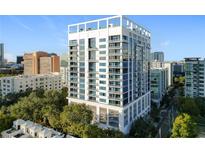 Aerial view of a modern highrise building in a city setting at 260 S Osceola Ave # 1611, Orlando, FL 32801