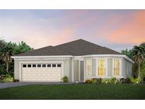 One-story home with a two-car garage and landscaping at 13648 Fresh Ivy St, Winter Garden, FL 34787