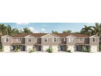 Modern three-unit townhome building with attached garages and neutral color palette at 2917 Hudson Hammock Way, Saint Cloud, FL 34773