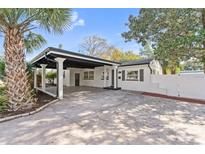 Updated home exterior boasts carport and charming curb appeal at 2800 E Anderson St, Orlando, FL 32803