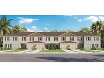 Three-unit townhome building with attached garages and landscaping at 3326 Private Oak Dr, Apopka, FL 32703