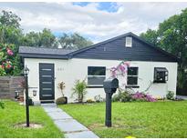 Charming bungalow with modern exterior and landscaping at 631 Callahan St, Winter Park, FL 32789