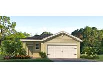 One-story house with a two-car garage and landscaping at 3472 Sandalwood Isle Way, Ocoee, FL 34761