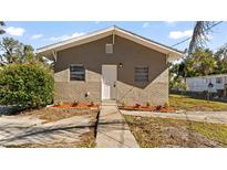 Newly renovated house with a landscaped front yard at 5526 Lily Rd, Lakeland, FL 33811