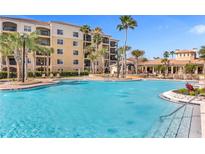 Resort-style pool with ample deck space for lounging at 8774 Worldquest Blvd, Orlando, FL 32821