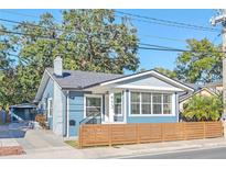 Charming craftsman home with a modern exterior and a fenced yard at 413 W Princeton St, Orlando, FL 32804