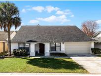One-story house with gray roof, attached garage, and well-manicured lawn at 783 Tomlinson Ter, Lake Mary, FL 32746
