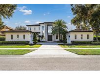 Stunning two-story home with modern design and landscaping at 11618 Vinci Dr, Windermere, FL 34786