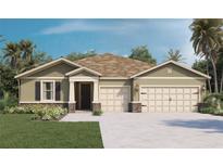 Two-story house with a two-car garage and stone accents at 1664 Three Bars Rd, Kissimmee, FL 34744