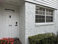 Inviting front door entrance with keyless entry and landscaping at 466 W Par St # 466, Orlando, FL 32804