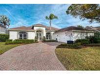 Beautiful one-story home with brick driveway and lush landscaping at 3788 Brantley Place Cir, Apopka, FL 32703