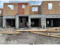 Exterior view of townhomes under construction at 4299 Campsite Loop, Orlando, FL 32824