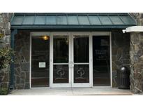 Entrance to Wellesley Terrace Condo with doors and signage; 630 Vassar Street address at 630 Vassar St # 2310, Orlando, FL 32804