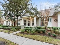 Inviting exterior of charming villa with landscaped front yard and walkway at 2609 Corona Borealis Dr, Orlando, FL 32828