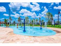 Fun spray park for with interactive water features at 3151 Paradox Cir # 405, Kissimmee, FL 34746