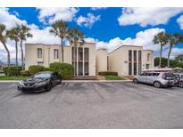 Two-story condo building with ample parking and lush landscaping at 532 Orange Dr # 23, Altamonte Springs, FL 32701