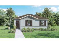 One-story home with gray siding, brown roof, and landscaped front yard at 1676 Hummingbird Rd, Winter Haven, FL 33884