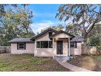 Charming single-story home with a newly renovated exterior and landscaping at 308 Wade Ave, Deland, FL 32724