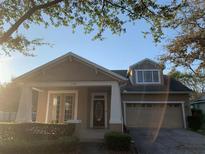 Attractive Craftsman style home with two-car garage at 6344 Earthgold Dr, Windermere, FL 34786