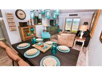 Charming dining area with ocean views and unique decor at 4153 S Atlantic Ave # 1030, New Smyrna Beach, FL 32169