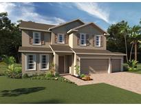 Two-story house with tan siding, brown roof, and a two-car garage at 4170 Gooseberry Trl, Kissimmee, FL 34746