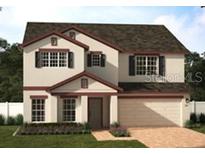 Two-story house with a two-car garage and landscaping at 1173 Stratton Ave, Groveland, FL 34736