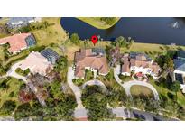 Luxury home community with lakefront properties and lush landscaping at 2224 Alaqua Dr, Longwood, FL 32779