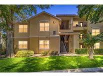 Well-maintained condo building with attractive landscaping at 2624 Robert Trent Jones Dr # 615, Orlando, FL 32835