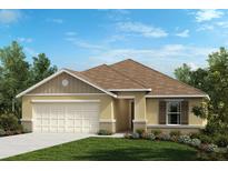 One-story home with a two-car garage and landscaped front yard at 2664 Hancock Crossing Dr, Bartow, FL 33830