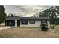 Newly renovated single story home with screened porch at 2863 County Road 238 # 238, Wildwood, FL 34785