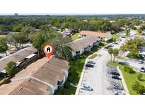 Aerial view of condo community showing building location and parking at 310 Cherokee Ct # B, Altamonte Springs, FL 32701