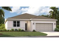 One-story home with a two-car garage and landscaped lawn at 1682 Blue Lagoon Cir, Mascotte, FL 34753