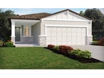 One-story home with two-car garage, stone accents, and landscaping at 3849 Giorgio Dr, Winter Haven, FL 33884