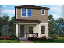 Two-story home with neutral siding, front porch, manicured lawn, and decorative flower beds at 5087 Railroad Vine Aly, Winter Garden, FL 34787