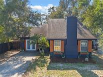 Newly renovated home featuring a stylish exterior and a welcoming front entrance at 1254 Seminola Blvd, Casselberry, FL 32707