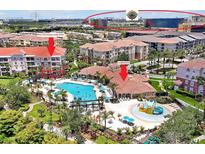 Aerial view of 5012 Shoreway Loop #102 with pool, clubhouse, and nearby attractions like the ICON Park ferris wheel at 5012 Shoreway Loop # 10207, Orlando, FL 32819