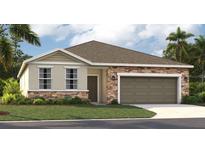 One-story house with stone accents and a two-car garage at 33431 Seattle Slew Dr, Sorrento, FL 32776