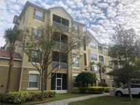 Attractive three-story building with balconies and ample parking at 3344 Robert Trent Jones Dr # 30505, Orlando, FL 32835