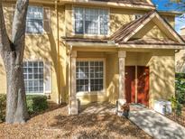 Charming townhouse exterior with a cozy porch and inviting front door at 832 Grand Regency Pt # 102, Altamonte Springs, FL 32714