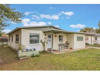 Charming single story home with well-manicured lawn and attractive landscaping at 2914 Sprague Dr, Orlando, FL 32826