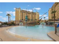 Resort-style pool with a pirate ship water feature and surrounding lounge chairs at 8101 Resort Village Dr # 31308, Orlando, FL 32821