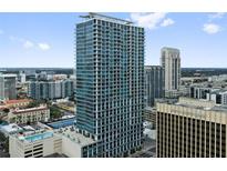 High-rise building with city views and a pool at 150 E Robinson St # 2908, Orlando, FL 32801