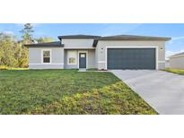 Charming one-story home with a well-manicured lawn and a two-car garage at 265 Marion Oaks Mnr, Ocala, FL 34473