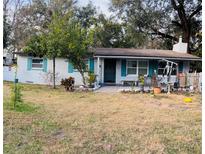 Charming single-story home with a well-maintained lawn and teal accents at 807 Richbee Dr, Altamonte Springs, FL 32714