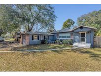 Charming single-story home with a well-manicured lawn and inviting curb appeal at 2106 Cordova Dr, Sanford, FL 32771
