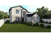 Beautiful two-story home featuring manicured lawn, modern design, and an attached two car garage at 1700 Underwood Ave, St Cloud, FL 34771