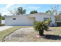 Newly renovated single story home with a paved driveway and landscaped yard at 660 Encino Way, Altamonte Springs, FL 32714