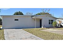 Newly constructed home with paved driveway and small front yard at 660 Encino Way, Altamonte Springs, FL 32714